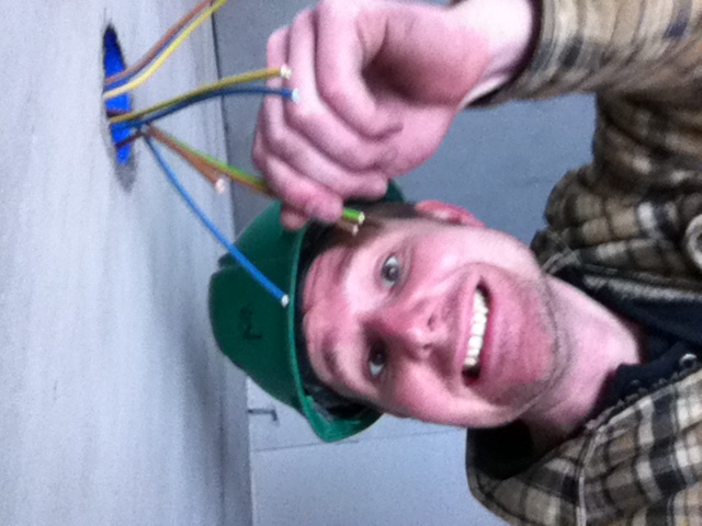 Grapefruit slice atop a pile of other slices